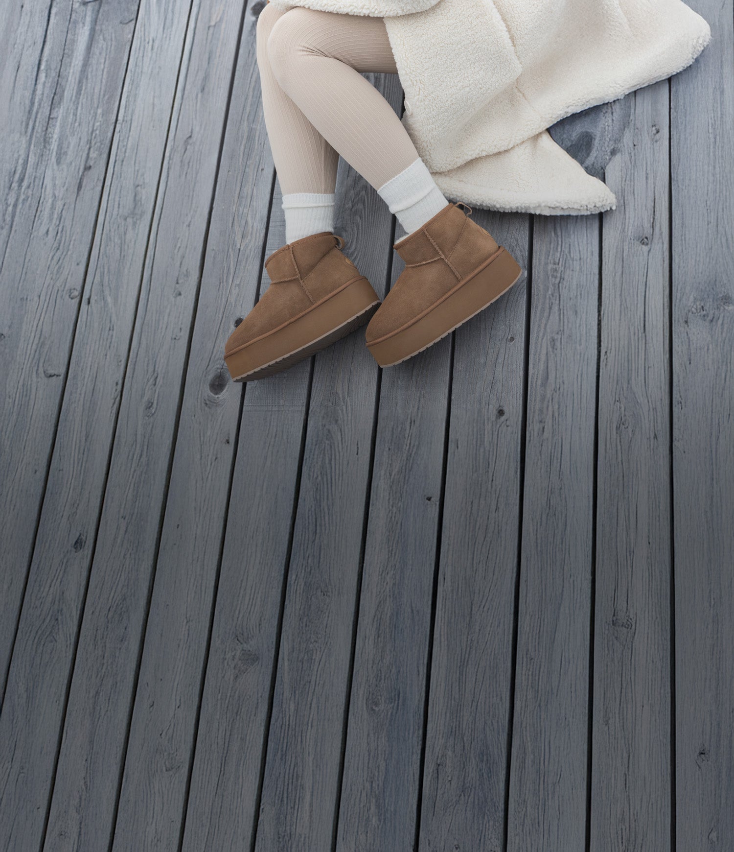 Stivaletti donna EMU Australia in shearling con suola platform, disponibili su Amuvia.